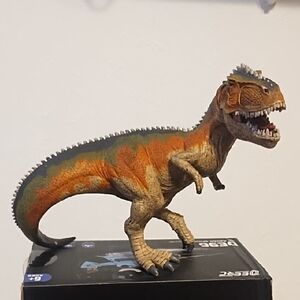 Vibrant Dinosaur Reptile Figurine - Orange and Green